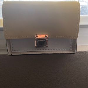 Yellow and white purse